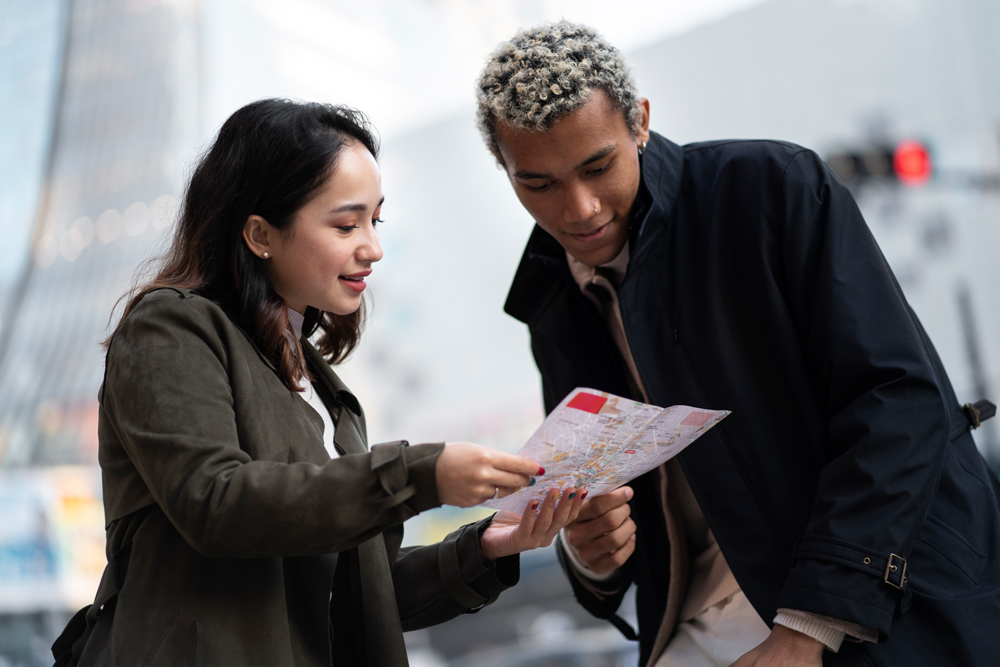 young friends traveling through japan | What Is Cross-Border Hiring and How Does It Benefit Businesses?